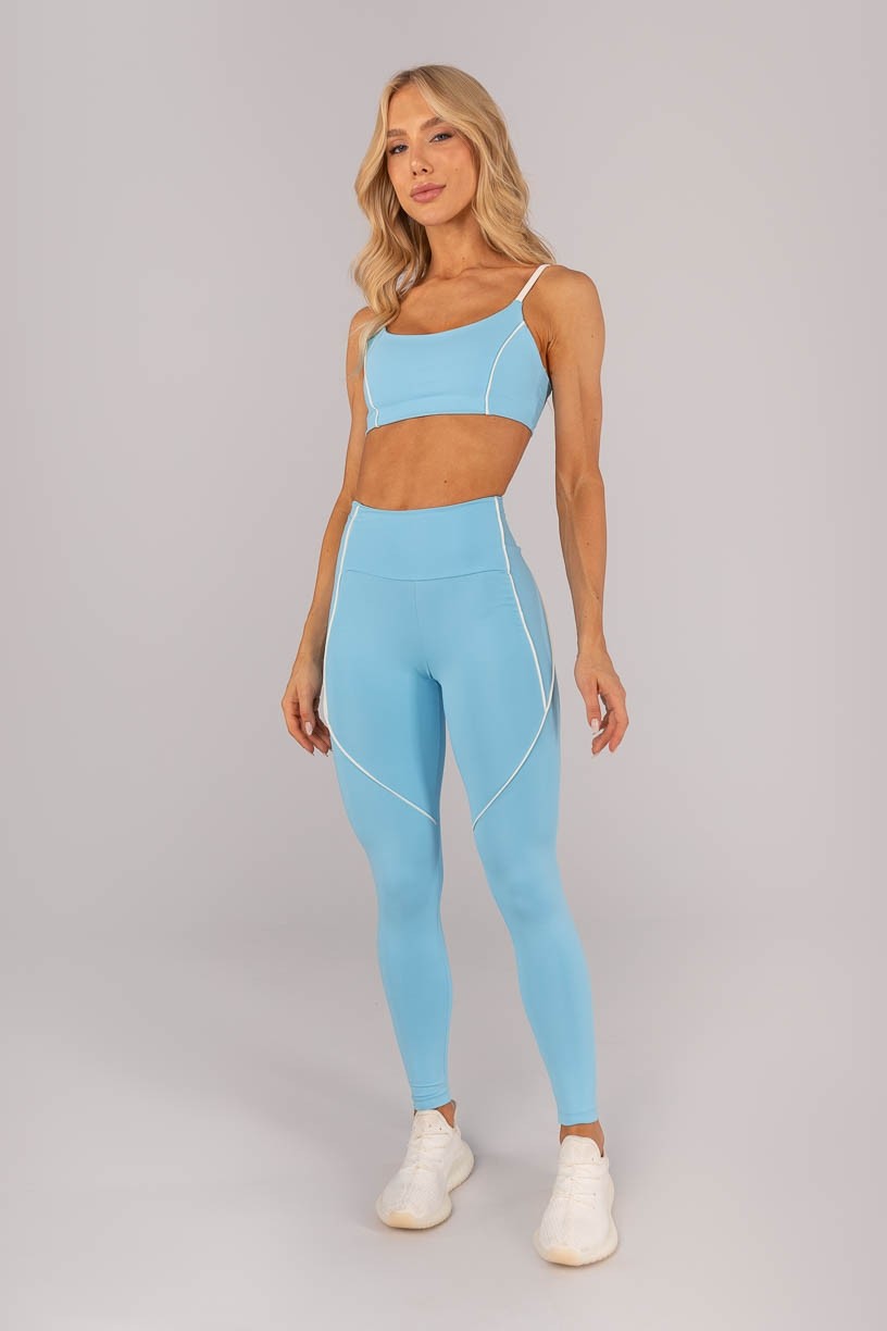 K4589-A_Calca_Legging_com_Bolso_e_Vivo_nas_Laterais_Azul_Ceu__Off-White__Ref:_K4589-A